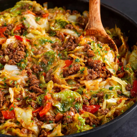 A skillet of ground beef and cabbage.
