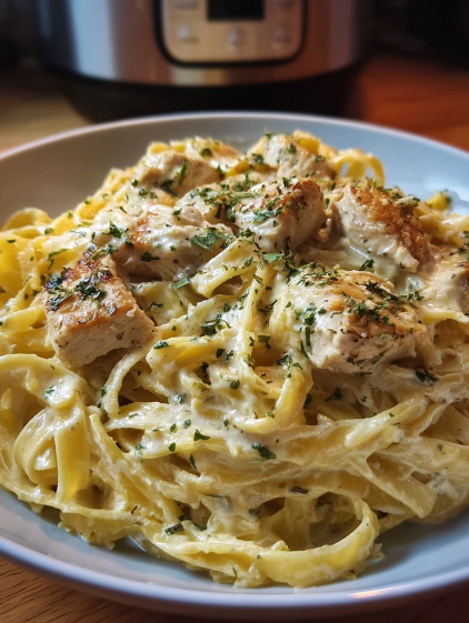 A plate of chicken Alfredo in the Instant Pot in 25 minutes.