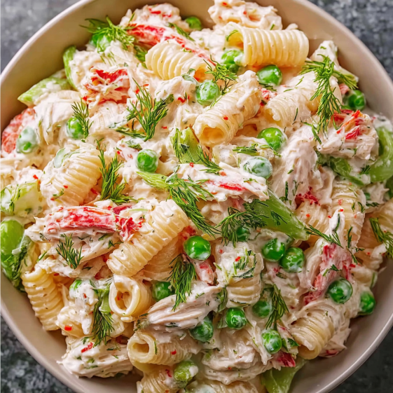 A bowl of crab pasta salad.