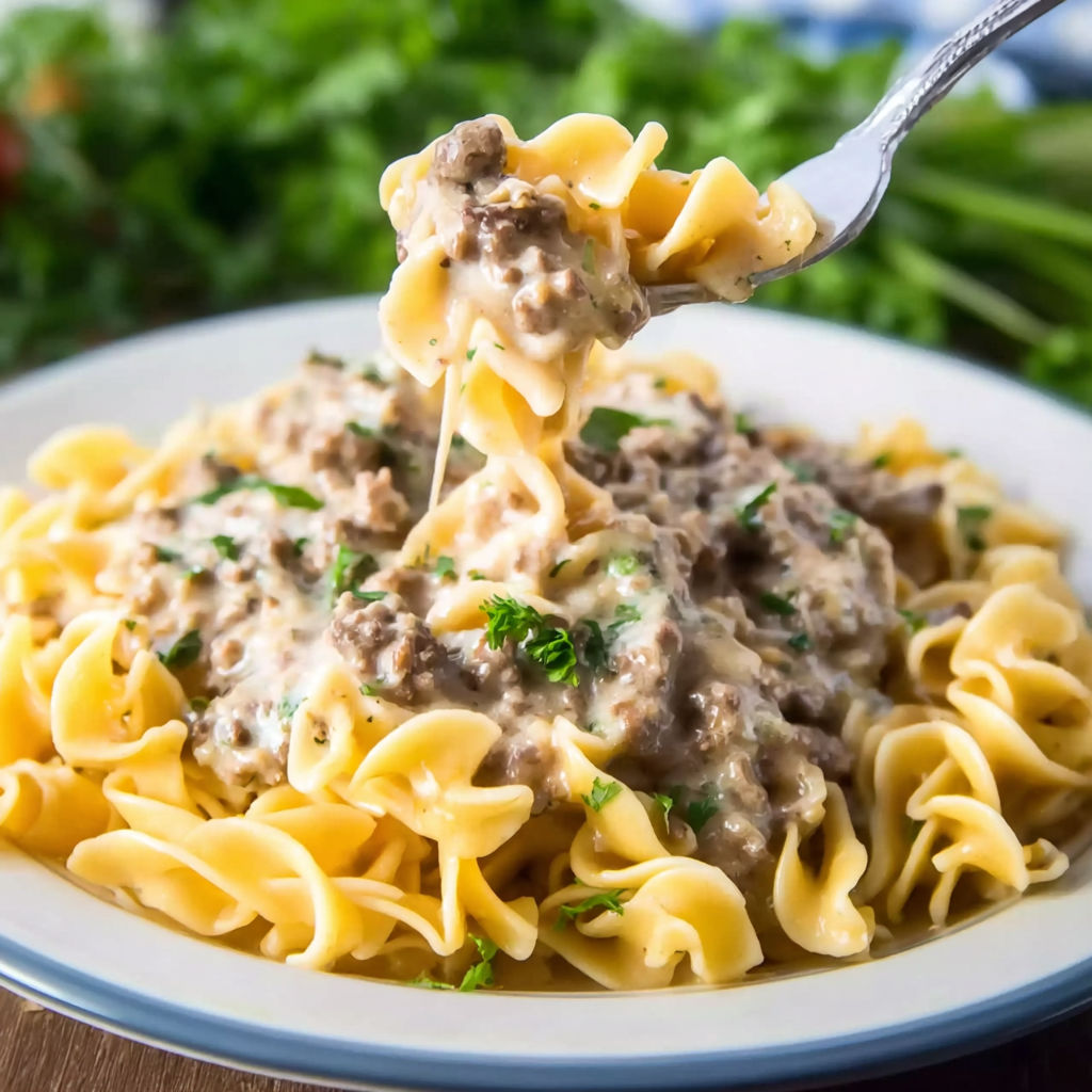A plate of food with a fork in it.