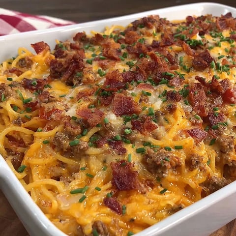 A dish of Cowboy Spaghetti Creamy Cheesy Twist.