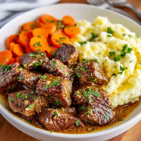 A bowl of meat and vegetables.